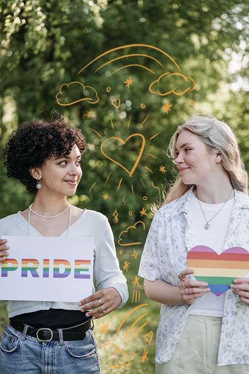 a photo of two people looking at each other holding pride signs